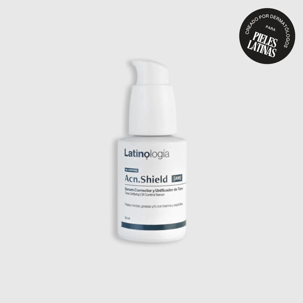 Envase de Acn.Shield Serum Corrector Latinología para unificar el tono y dar luminosidad a la piel.
