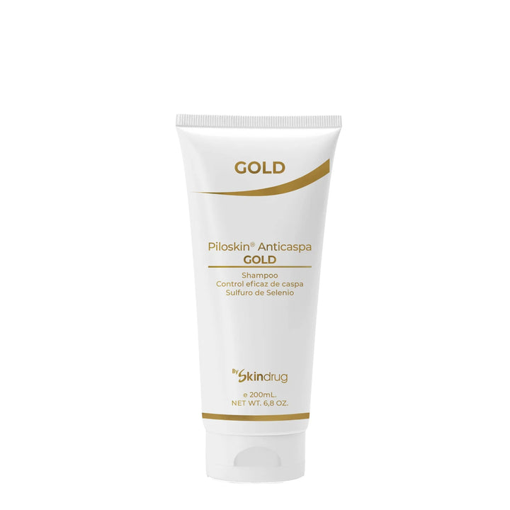 Shampoo para el control de la caspa Piloskin Anticaspa Gold de Skindrug.