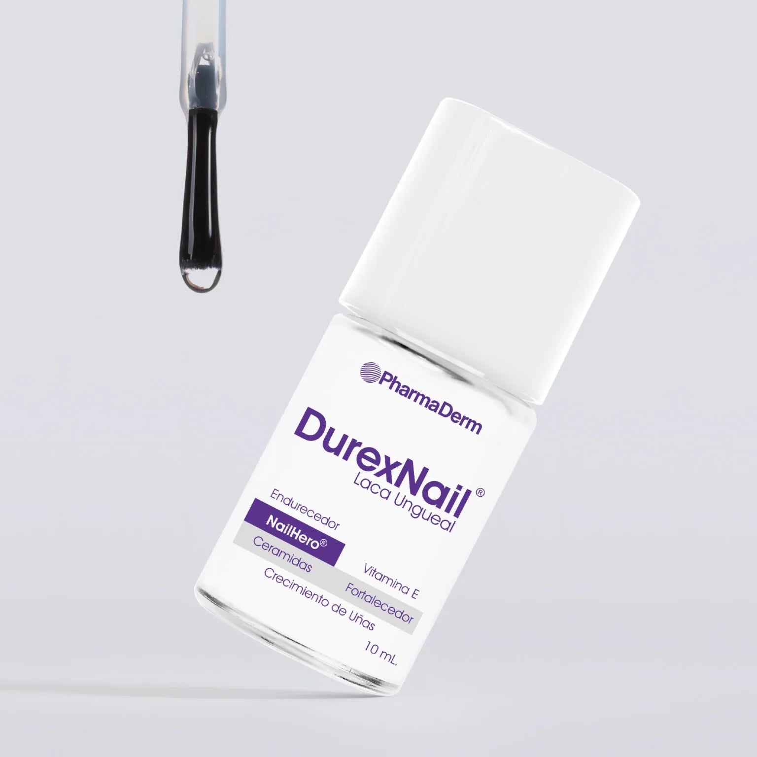 Laca ungueal fortalecedora Durexnail de Pharmaderm para uñas quebradizas.